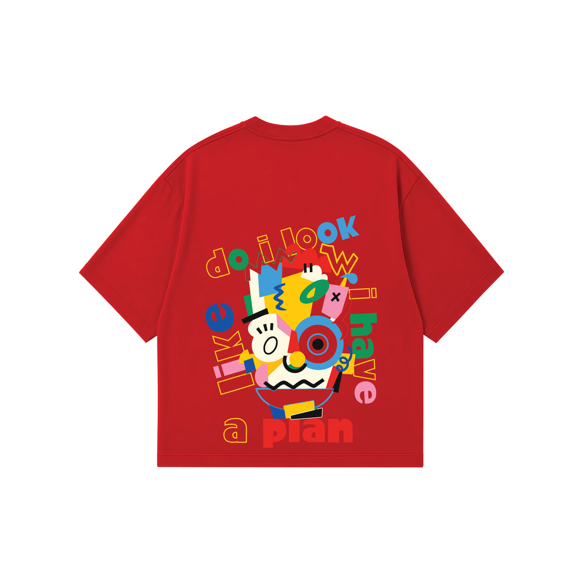 A red short-sleeve t-shirt with a colorful graphic print on the back. The graphic features a cartoon character and the words 'do i look like a plan' in multicolored text, set against a plain white background.